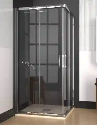 Cabine de duche de canto Altamira em vidro temperado cristalino com perfis cromados e base antideslizante, instalada num canto de casa de banho.