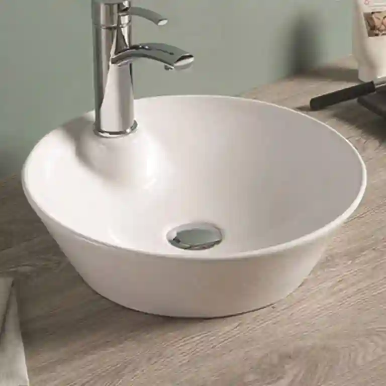 Lavatório de pousar com furo Philadelphia 1 Lavatório de pousar com furo Philadelphia redondo em cerâmica branca