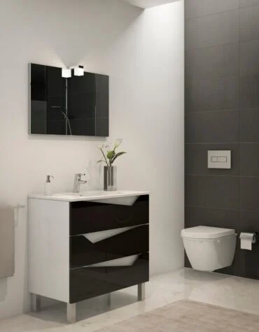 Móvel de casa de banho Splendia com corpo branco, gavetas lacadas em tom escuro à escolha e pés metálicos slim, contra parede clara