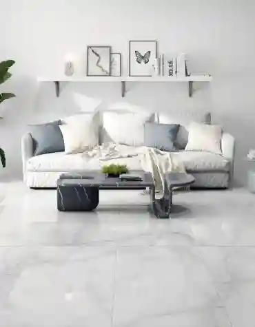 Sala de estar com pavimento cerâmico 60x120 Alpha – decoração neutra e luz natural envolvente