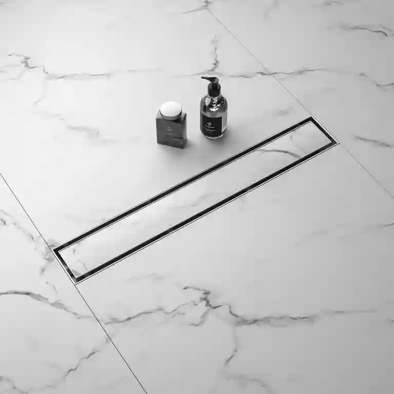 Ralo de duche para cerâmica com grelha reversível 1 Ralo de duche para cerâmica com grelha reversível inox polido, cartucho anti-odor e cesta de limpeza