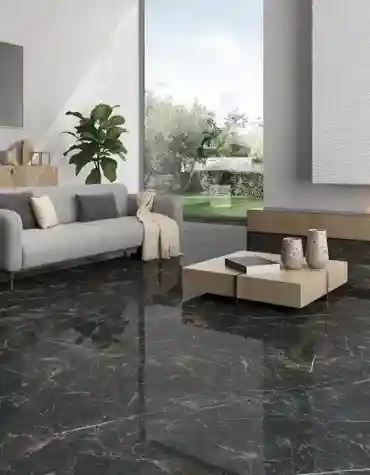 Detalhe de sala com pavimento cerâmico Gauguin preto polido – mármore negro com veios dourados