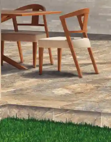 Degrau cerâmico Bahamas 33x120 com acabamento boleado aplicado em escadas de terraço com pavimento natural