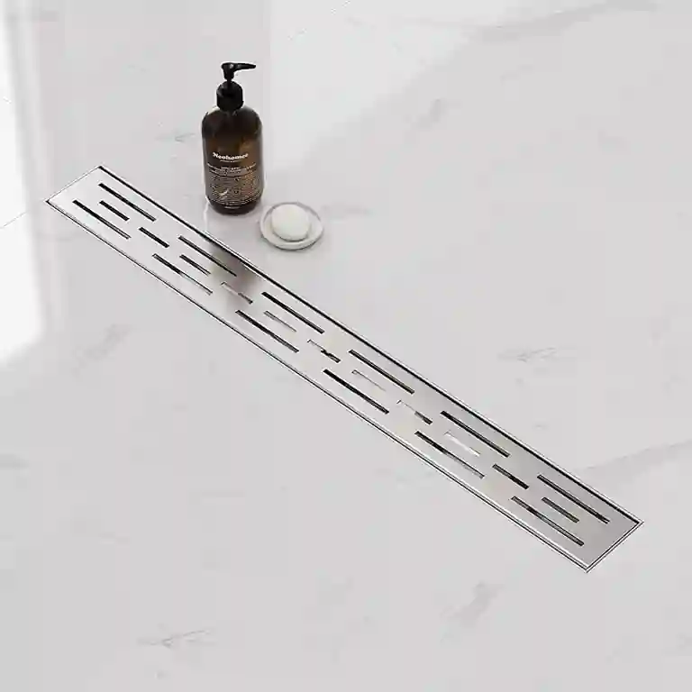 Ralo de duche inox polido com grelha perfurada 1 Ralo de duche inox polido com grelha perfurada, sifão anti-odor e cesta de limpeza