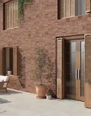 Pavimento cerâmico tijolo Elvas aplicado em fachada e terraço com mobiliário de exterior