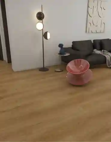 Sala moderna com Pavimento Vinílico SPC European Oak 6.5 mm , revelando o padrão caramelo do carvalho europeu e decoração contemporânea